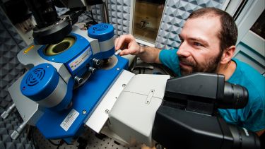 Dr Nic Mullin uses an atomic force microscope.